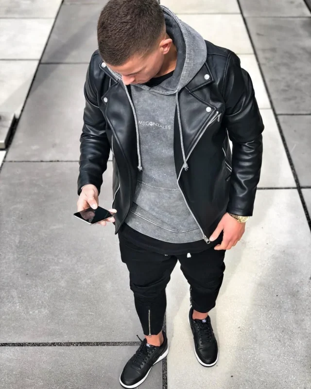  Black leather pants with a grey hoodie and white sneakers
